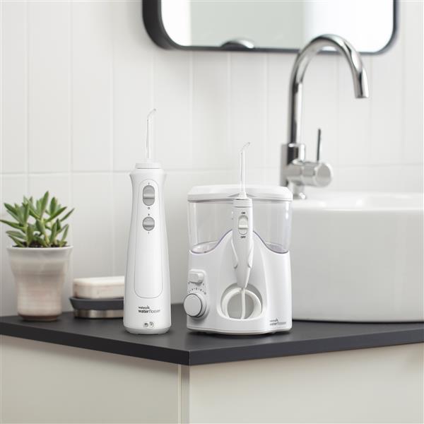 Ultra Plus WP-150 and Cordless Pearl Water WF-13CD010 Water Flossers in Bathroom