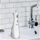 White Cordless Plus Water Flosser WP-450 In Bathroom
