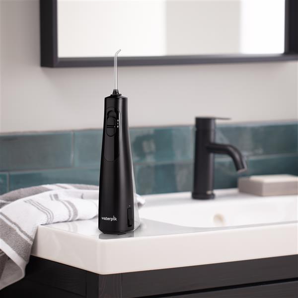 Black Cordless Enhance Water Flosser WF-21 in Bathroom